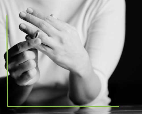 Image of a woman pulling off her wedding ring. Learn more at Jason Kisner, of Kisner Law Firm, Personal Injury, Divorce, and Medical Malpractice Lawyer in Hyattsville, MD.